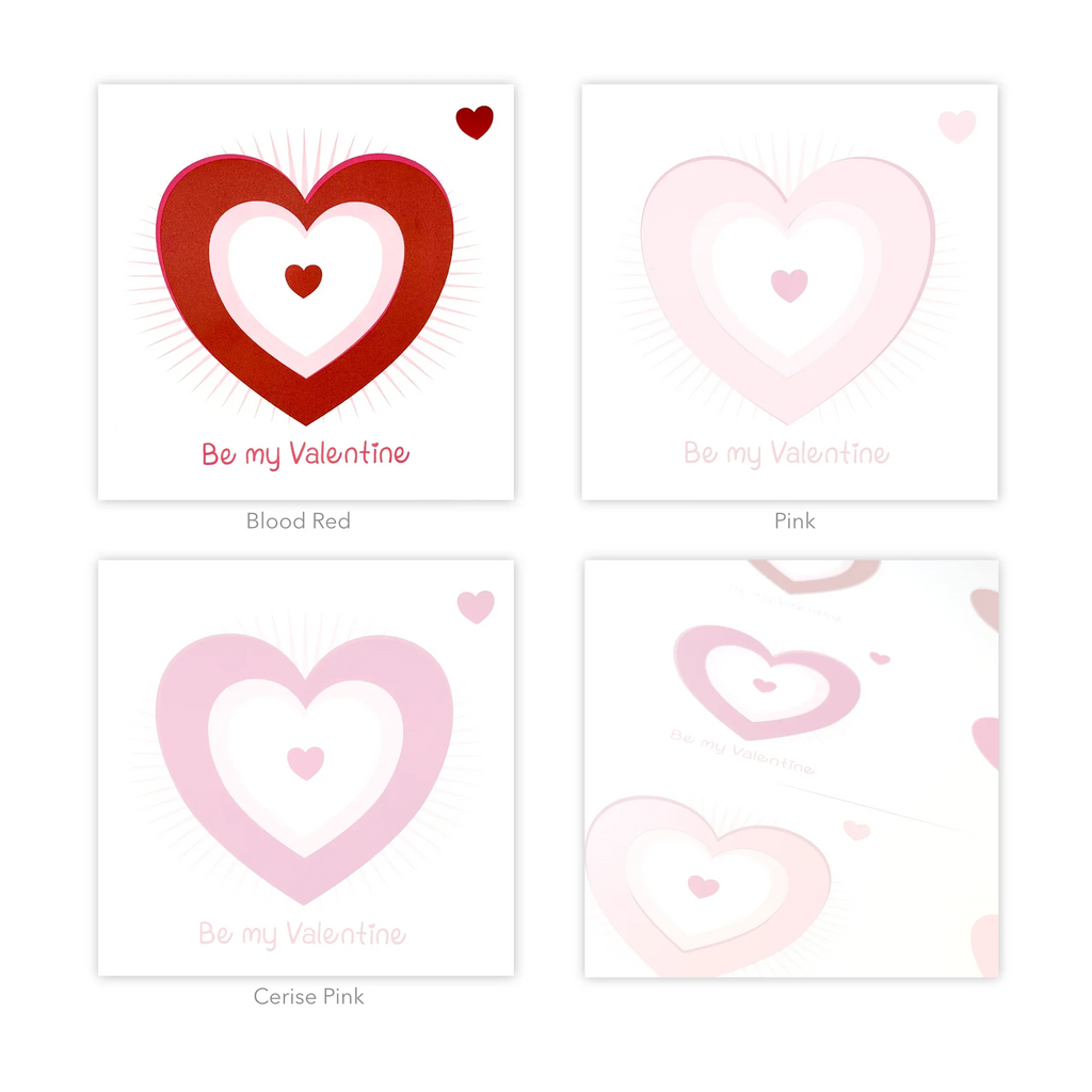 Handmade ceramic keepsake Valentine cards with heart design in red and pink color variations.
