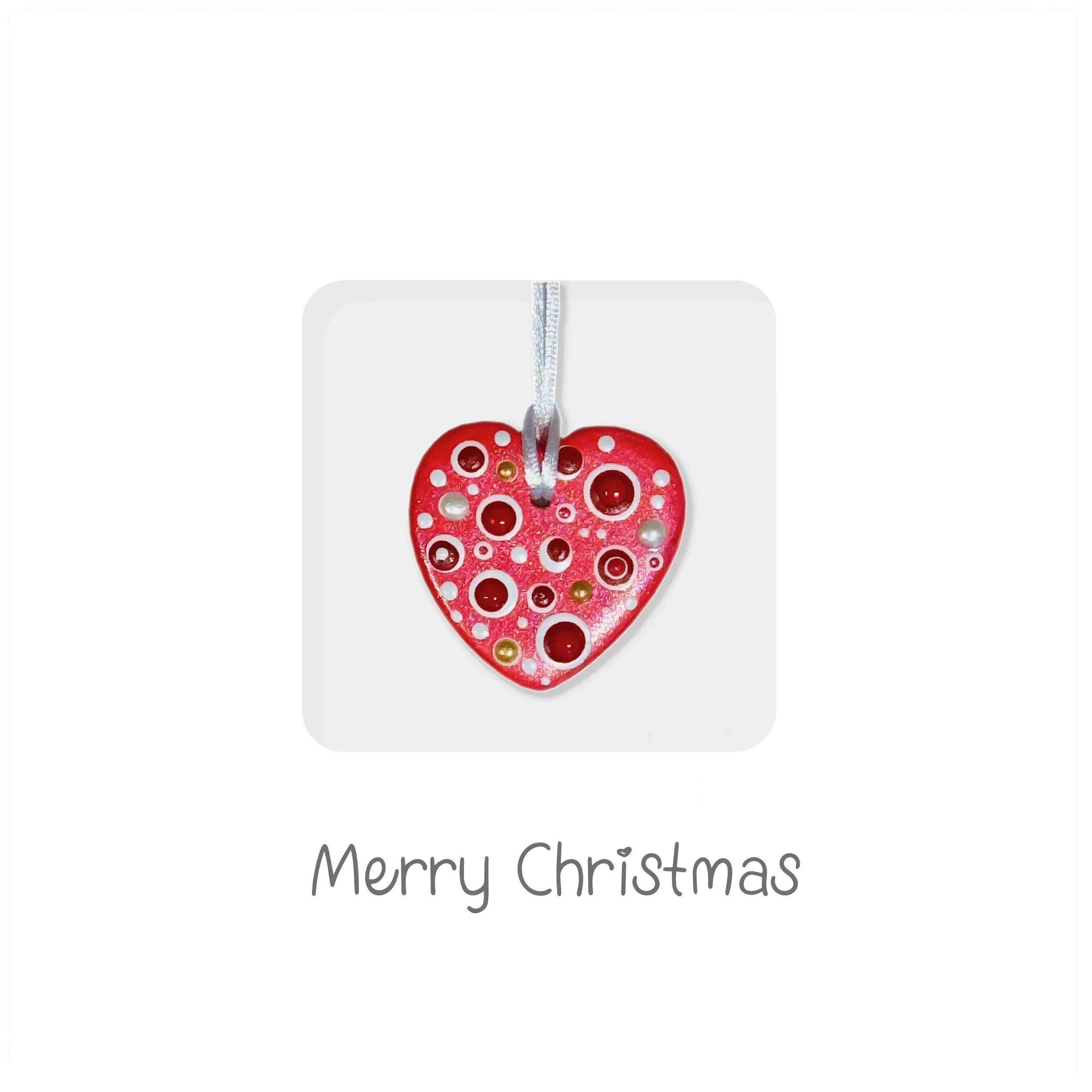 Handmade ceramic red heart Christmas ornament with polka dots and ribbon, Merry Christmas message